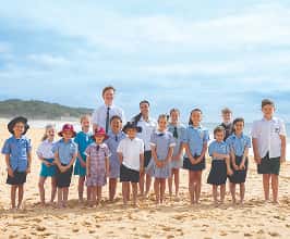 School kids on a beach