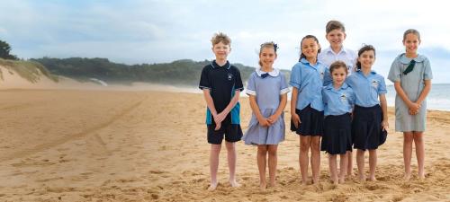 School kids on the beach